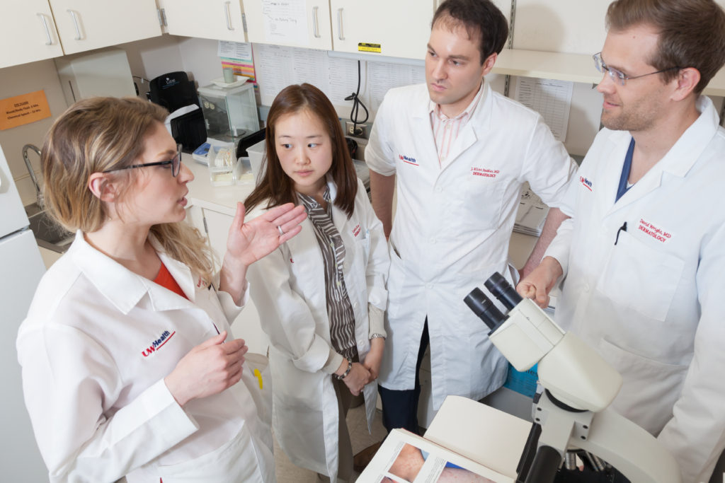 image of faculty and students